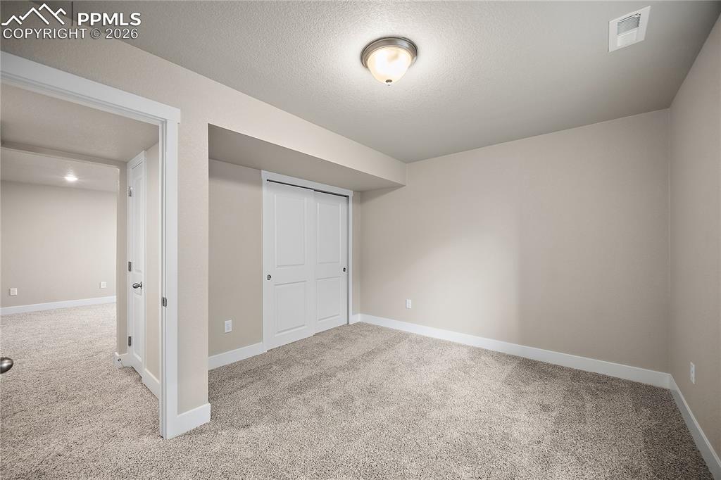 Image 32 of 34: Bedroom