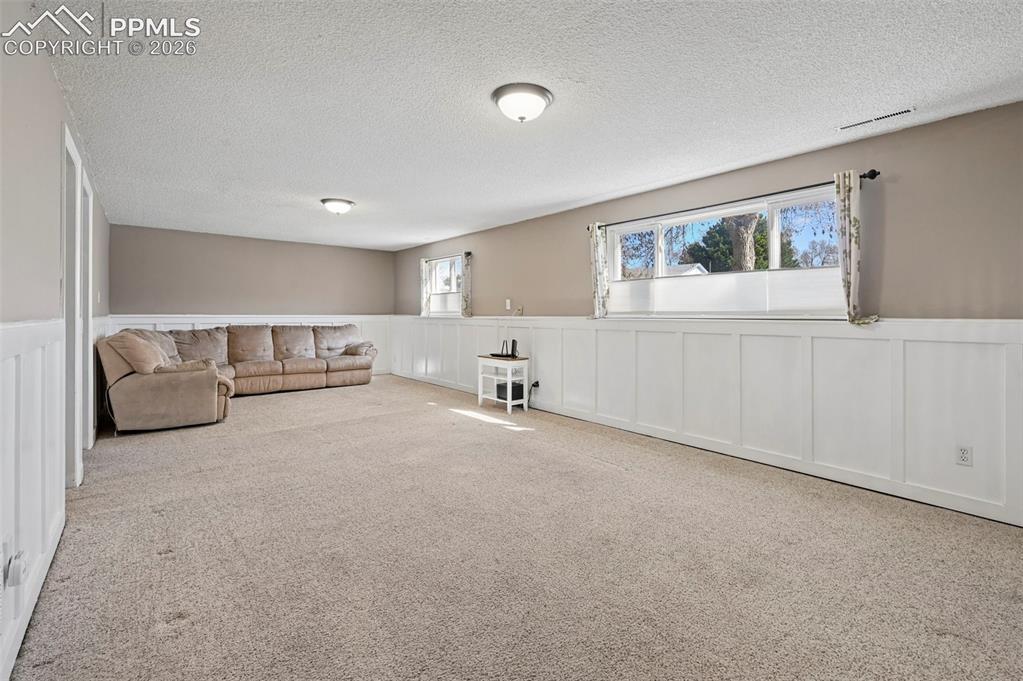Image 17 of 41: Lower Level Family Room Area