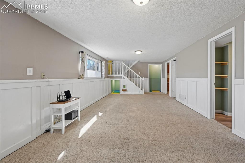 Image 22 of 41: Large Lower Level living area