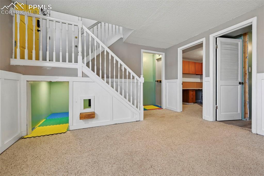 Image 26 of 41: Lower Level Family Room Area