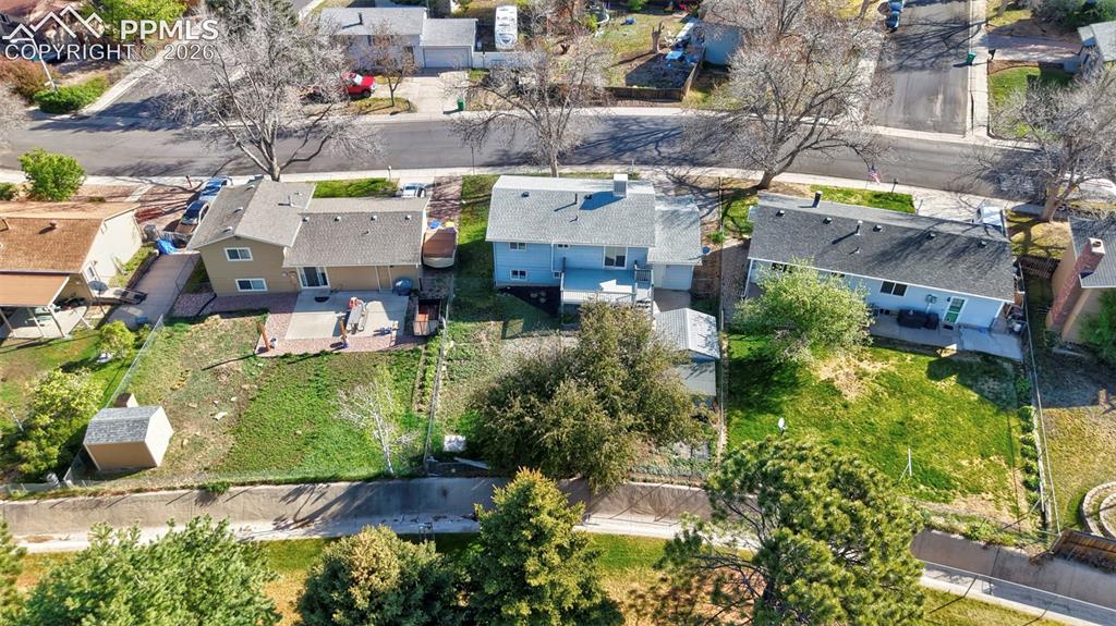 Image 28 of 41: Aerial View of back of home and street