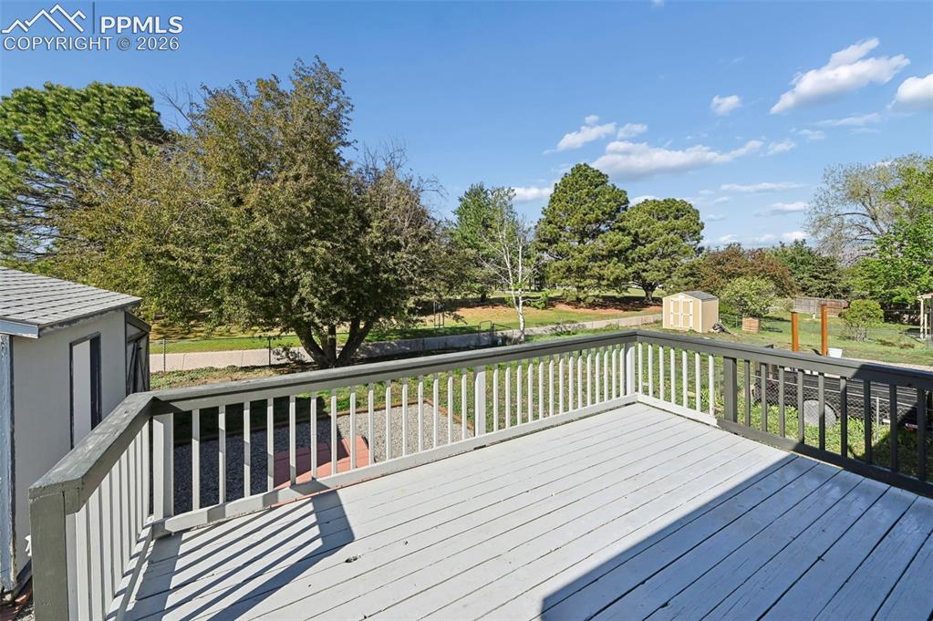 Image 5 of 41: Deck overlooking back yard