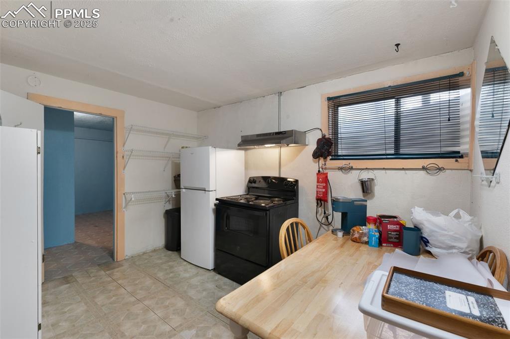 Image 31 of 50: Kitchen Area In Basement
