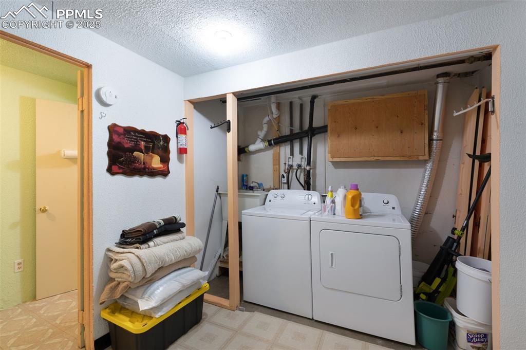 Image 38 of 50: Laundry Room In Basement