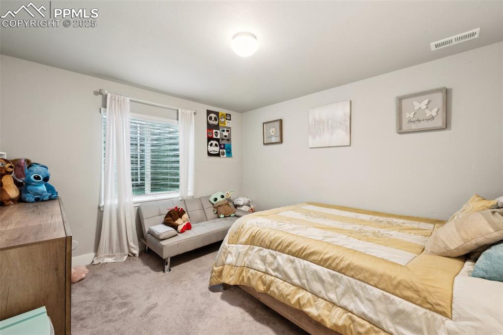 Image 32 of 43: Bedroom