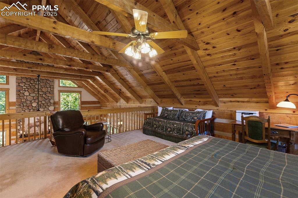 Image 20 of 46: Primary bedroom benefits from natural light and views of the Aspens/Pine Tr