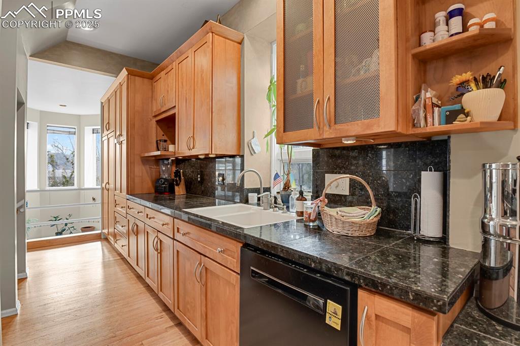 Image 9 of 34: Updated kitchen with custom cabinets
