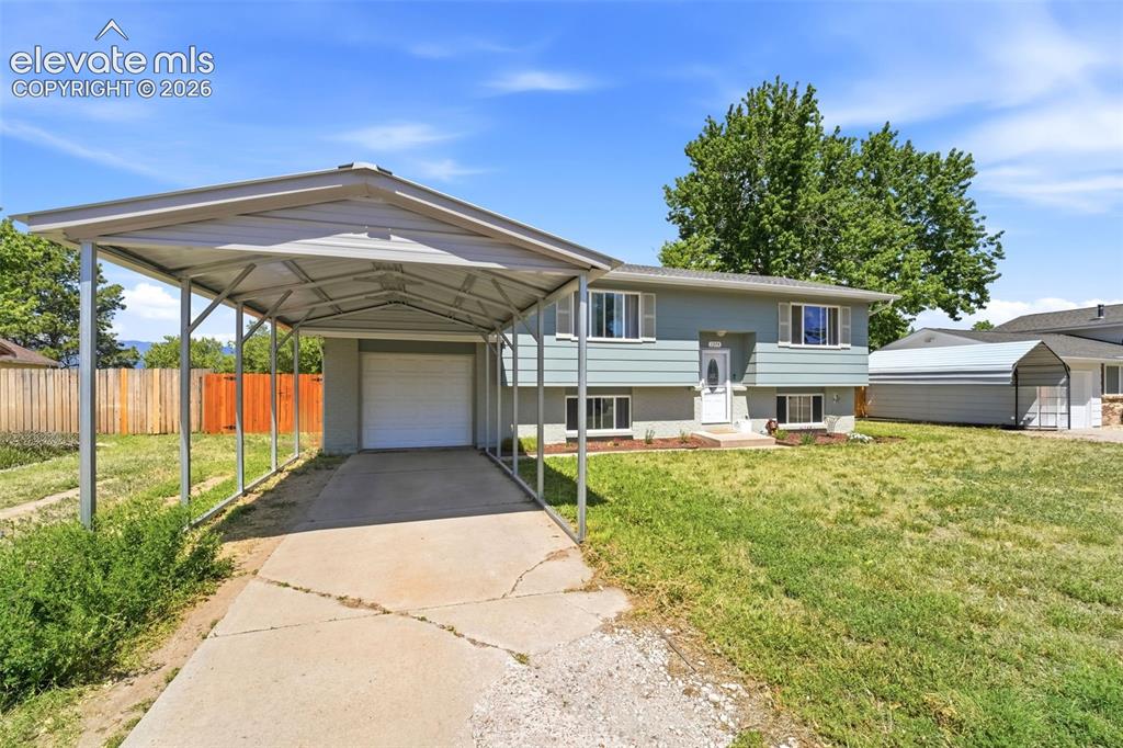 Image 4 of 46: Additional Off-street parking , next to garage and carport