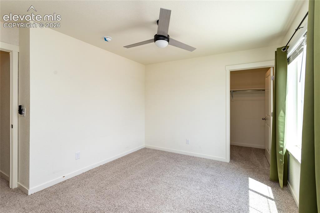 Image 33 of 48: Bedroom 3 with a walk-in closet