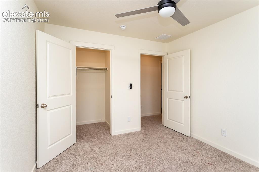 Image 36 of 48: Bedroom 4 with a walk-in closet