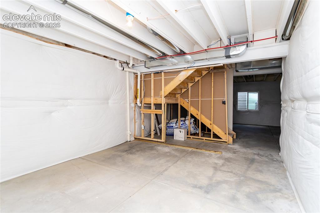 Image 41 of 48: Full unfinished basement offers many possibilities for future growth.