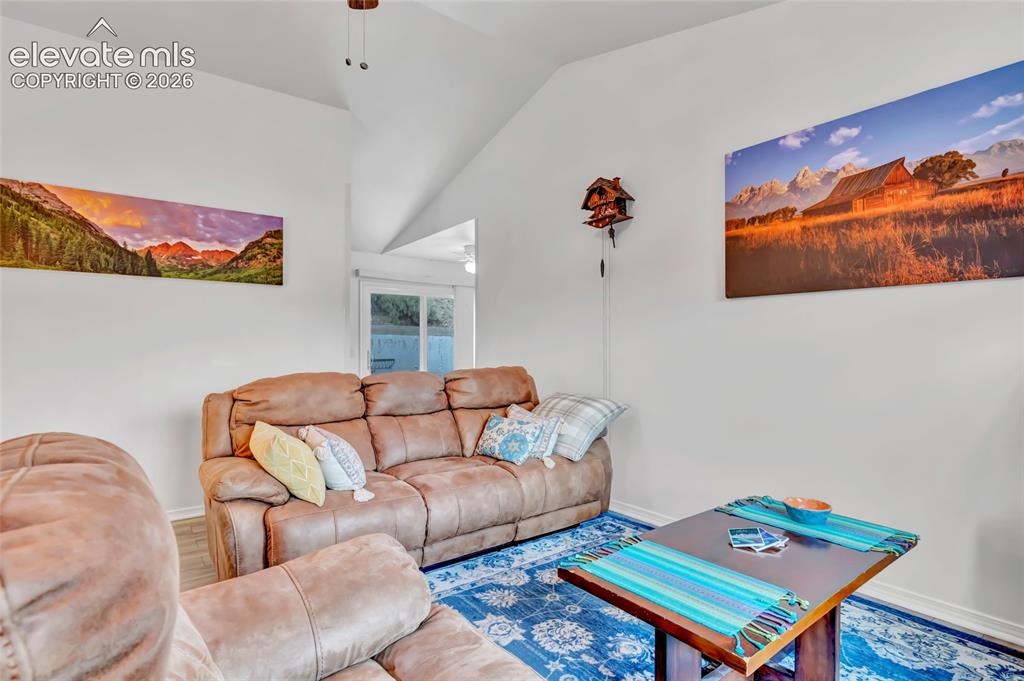 Image 10 of 28: As you enter the home you go into this lovely living room. The walls are br