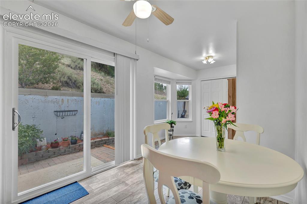 Image 13 of 28: This is the dining room/ breakfast nook off of the kitchen. The laundry fac