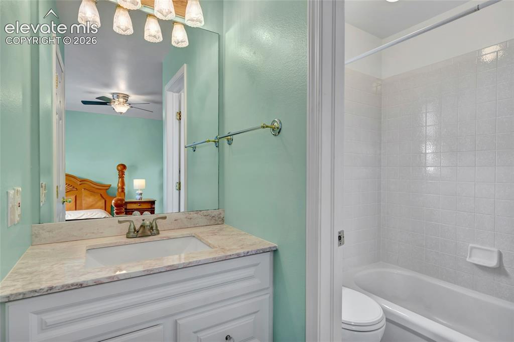 Image 19 of 28: Nice counter and storage under the sink
