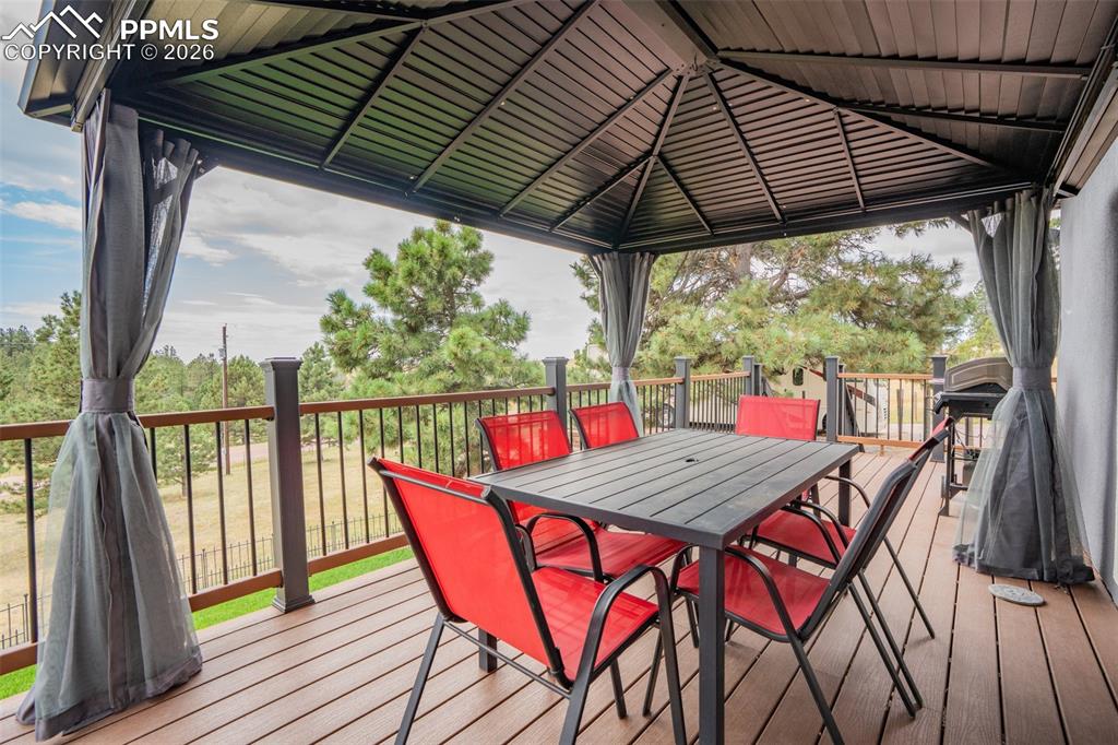 Image 14 of 47: Great outdoor dining space, pergola is included with purchase if the Buyer 