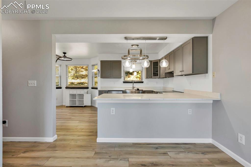 Image 21 of 47: The updated kitchen; completely new in 2024 features new cabinets, countert