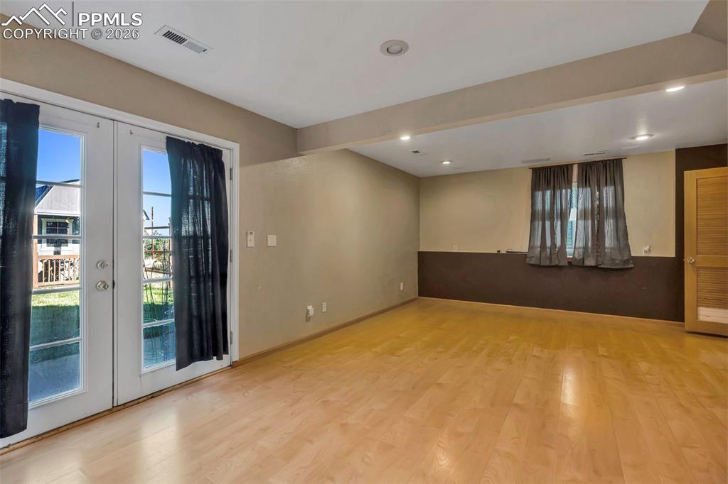 Image 38 of 47: Bedroom or family room; this space in the walk out basement is perfect for 