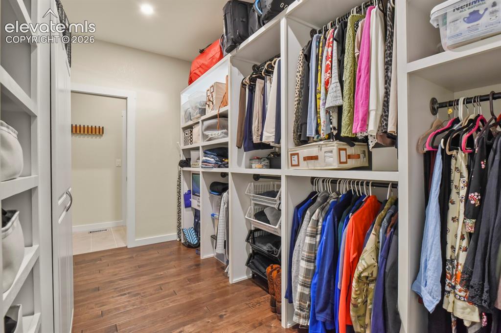 Image 20 of 50: Closet pass through to Laundry Room