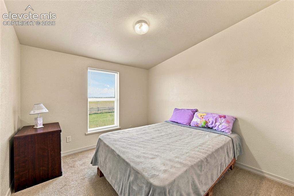 Image 15 of 27: Bedroom