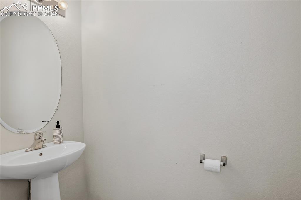 Image 8 of 20: Powder room - main level