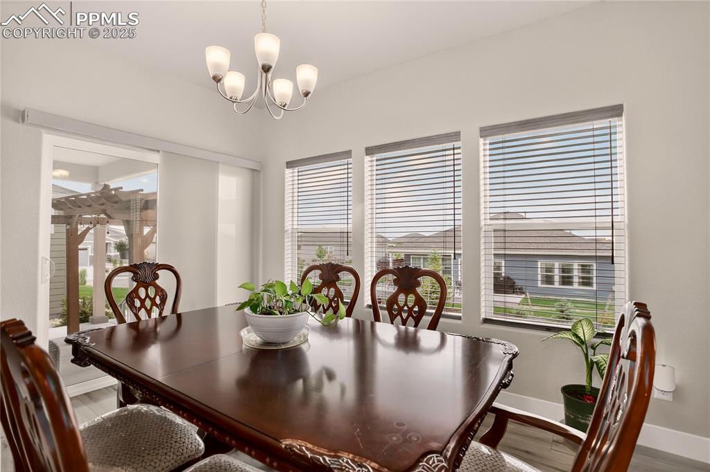 Image 12 of 38: Walk-out dining area