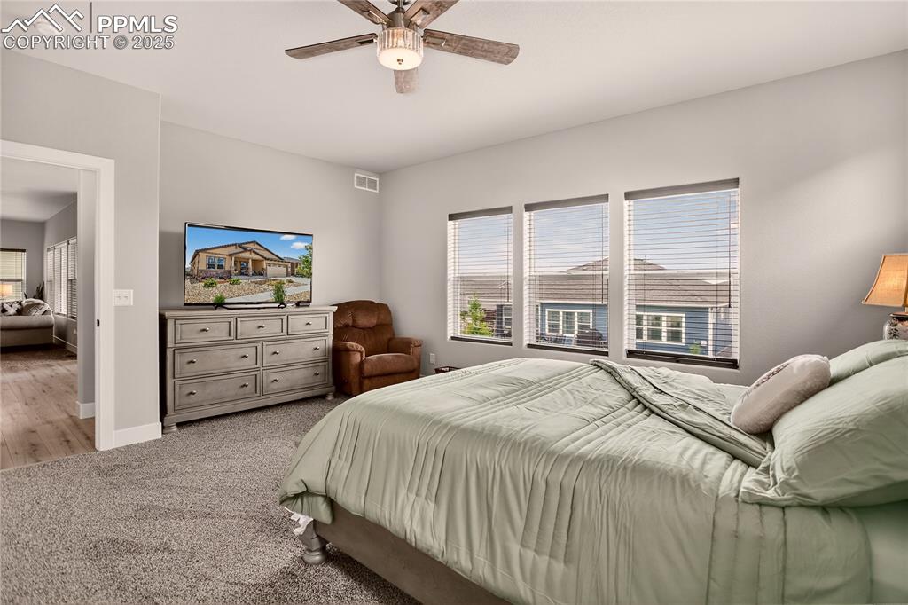 Image 15 of 38: Main Level Primary Suite