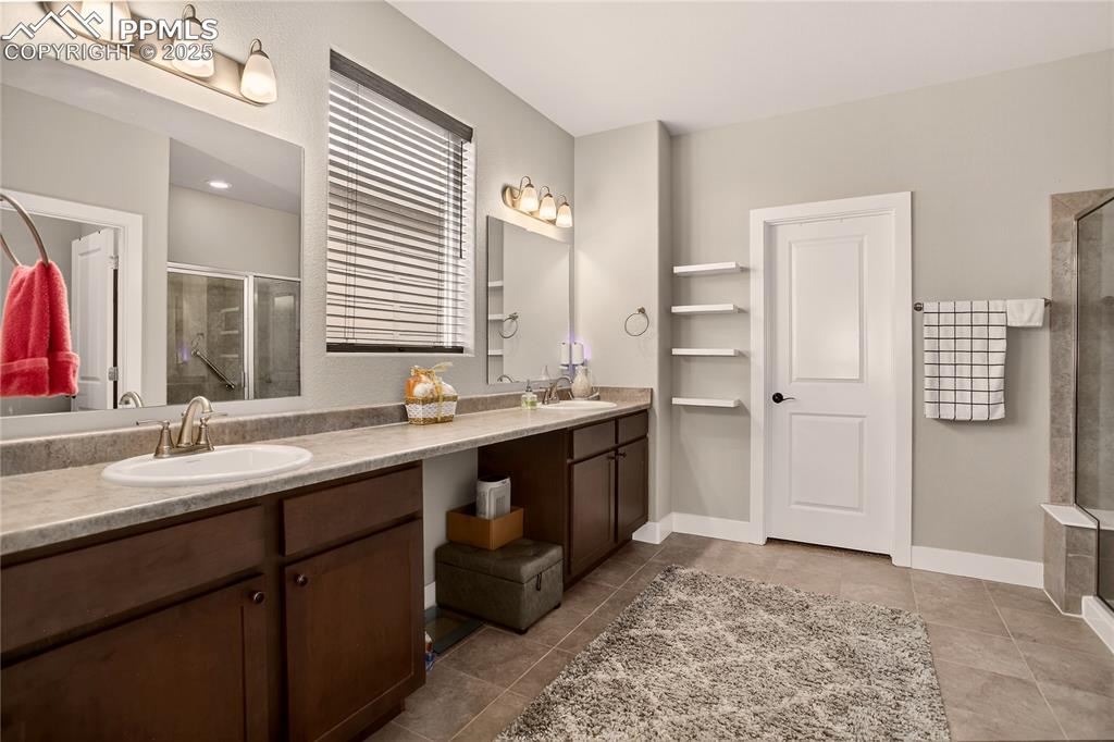 Image 16 of 38: Dual sink vanity