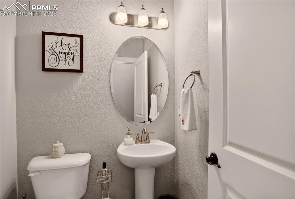 Image 24 of 38: Powder room - main level