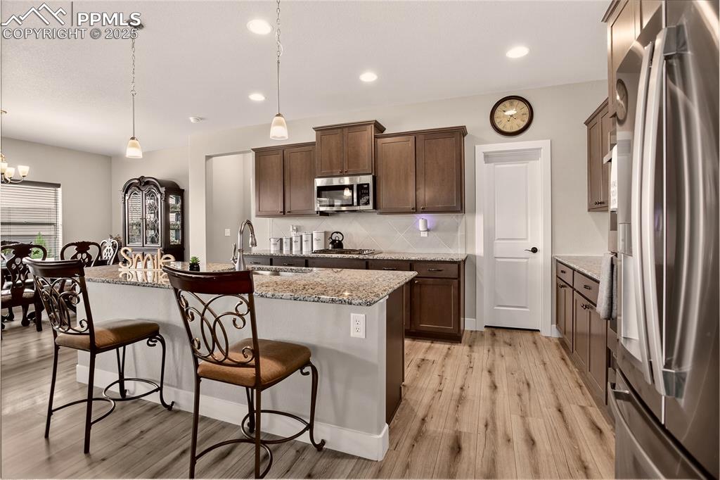 Image 4 of 38: SS appliances & walk-in pantry