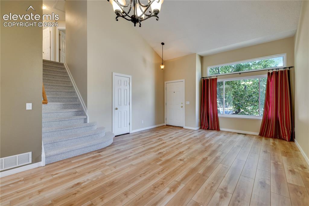 Image 11 of 47: Living room/dining room combo