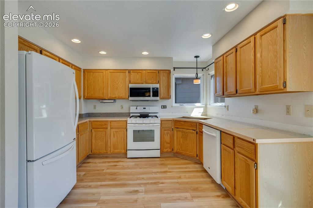 Image 19 of 47: New granite countertops and kitchen sink coming soon, look at granite sampl