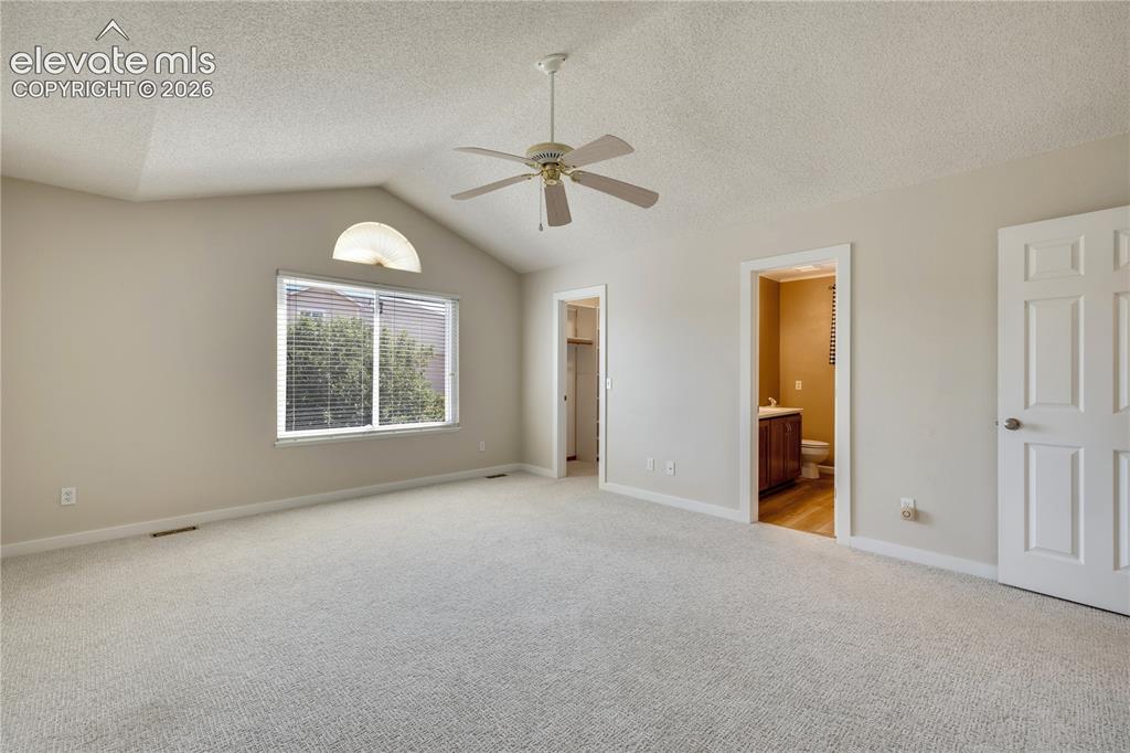 Image 26 of 47: Upper level master bedroom has new carpet