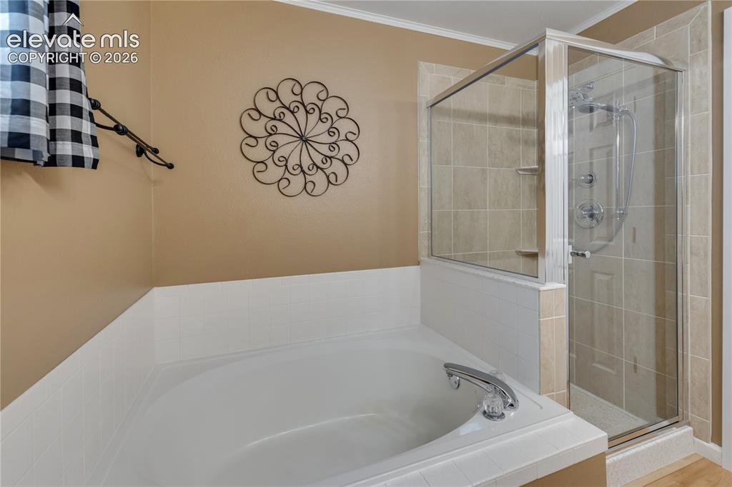 Image 30 of 47: Double sinks in remodeled master bathroom