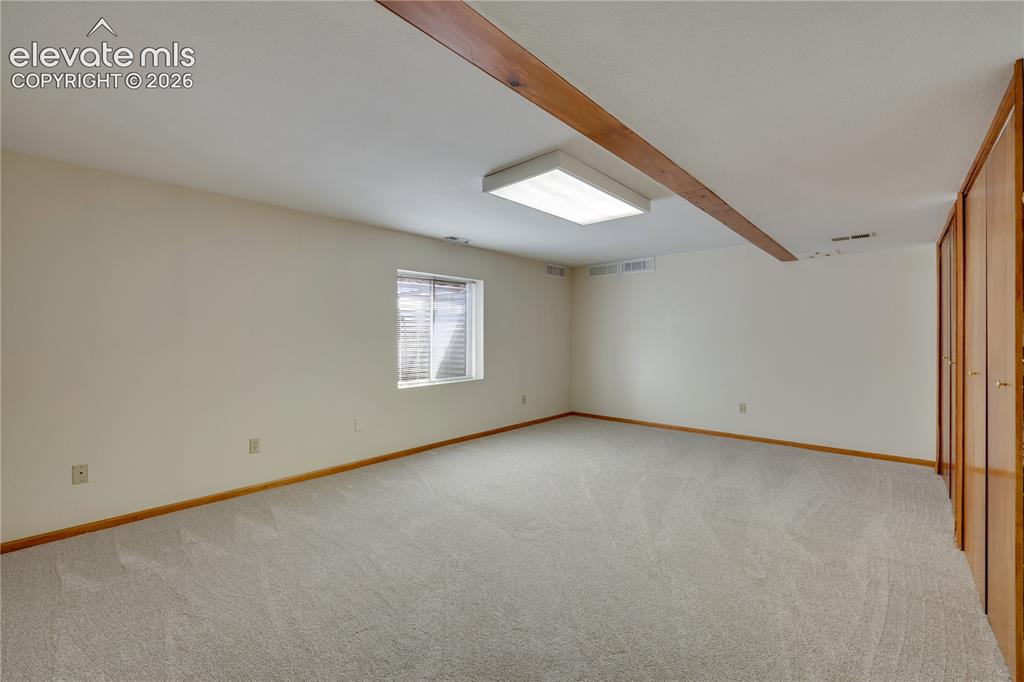 Image 38 of 47: Bonus room has new carpet