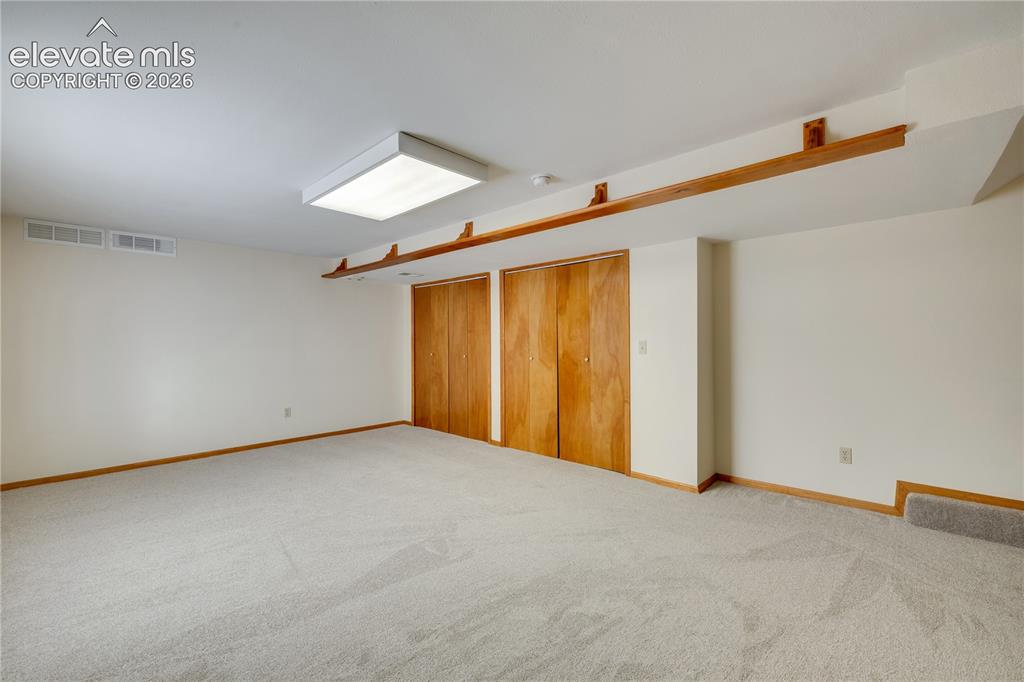 Image 39 of 47: 2nd family room in basement has new carpet