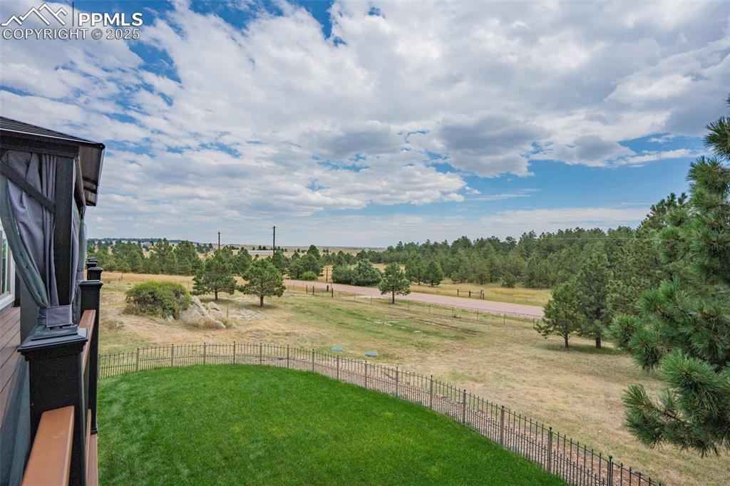 Image 13 of 47: Beautiful front yard is fenced separately, this is the view from the front 