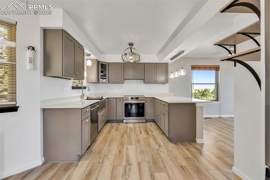 Image 22 of 47: From the new flooring to the kitchen update, there is nothing left to do bu