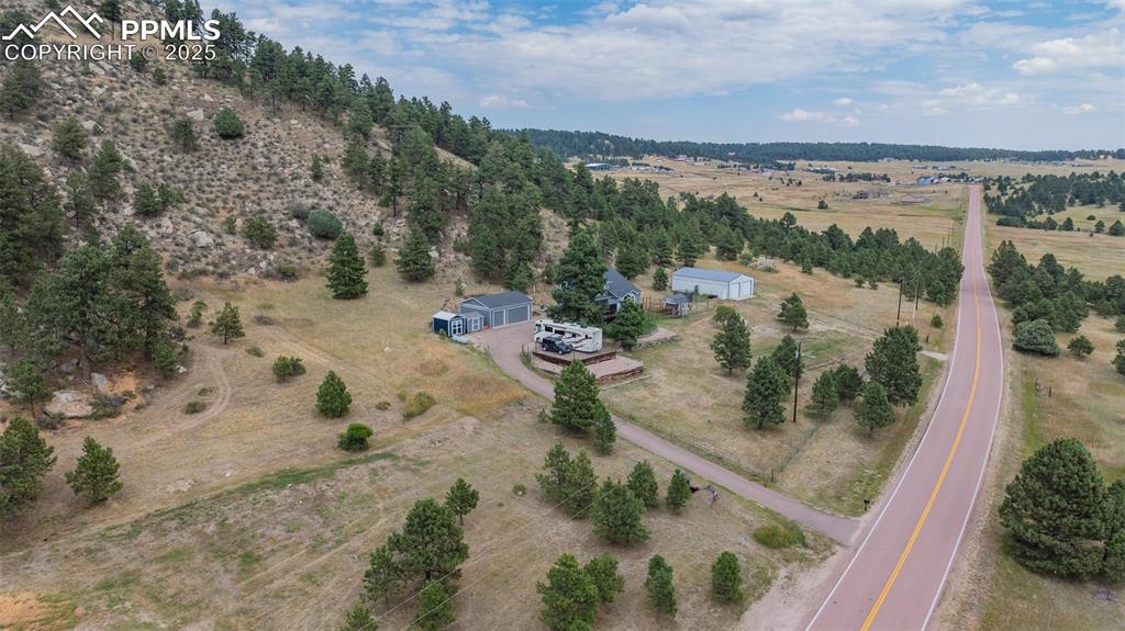 Image 47 of 47: Aerial view of property and surrounding area featuring rural landscape