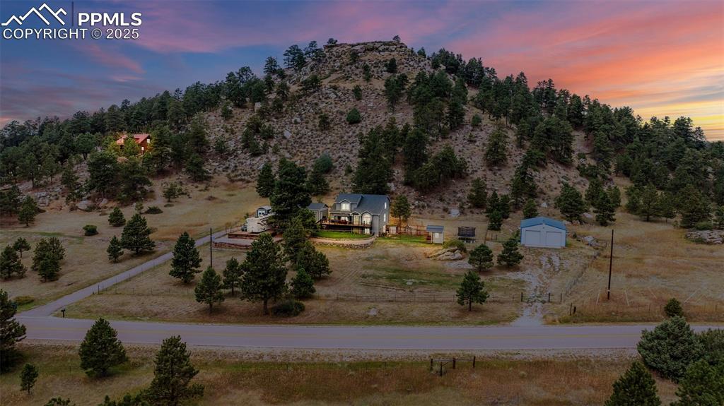 Image 5 of 47: Aerial view at dusk of this gorgeous Peyton Pines gem where quiet and tranq