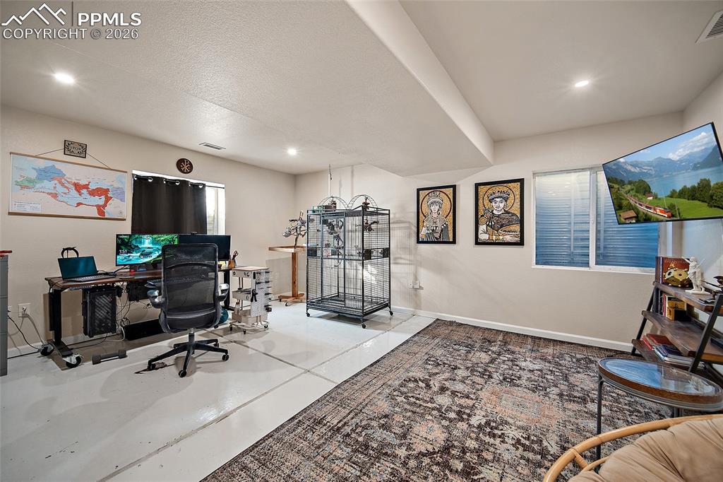 Image 31 of 48: Newly finished basement can be used as an office, family room, or additiona