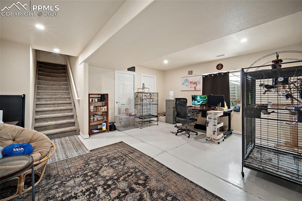 Image 32 of 48: Newly finished basement can be used as an office, family room, or additiona