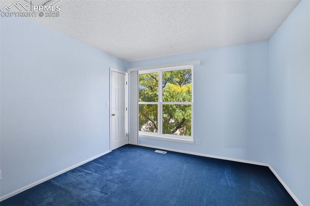 Image 18 of 45: second bedroom upper