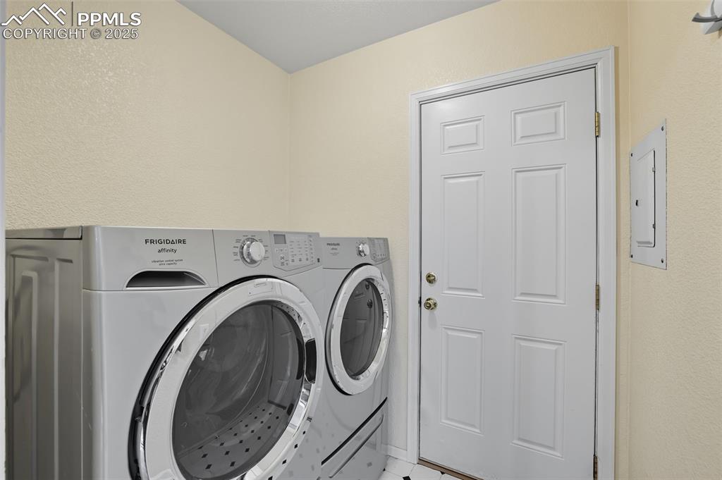 Image 29 of 45: Laundry- Main level with door to garage