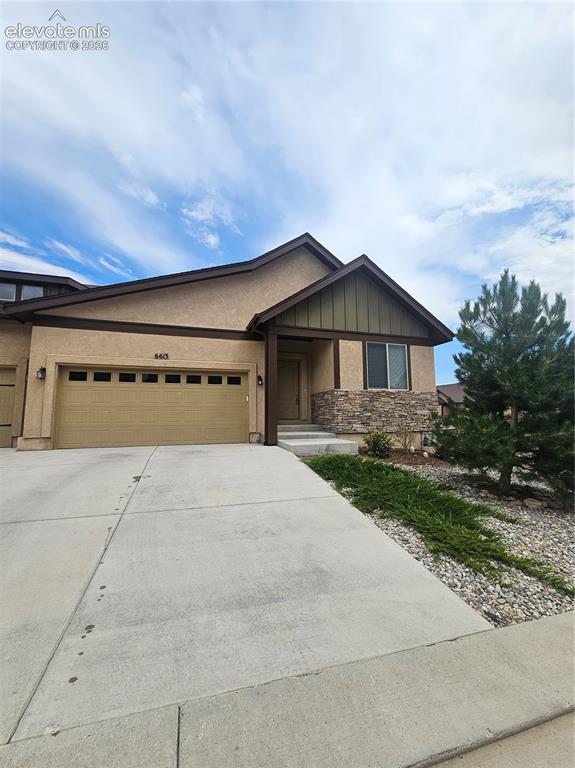 Image 1 of 32: A welcoming exterior with agenerous driveway and mature landscaping creates