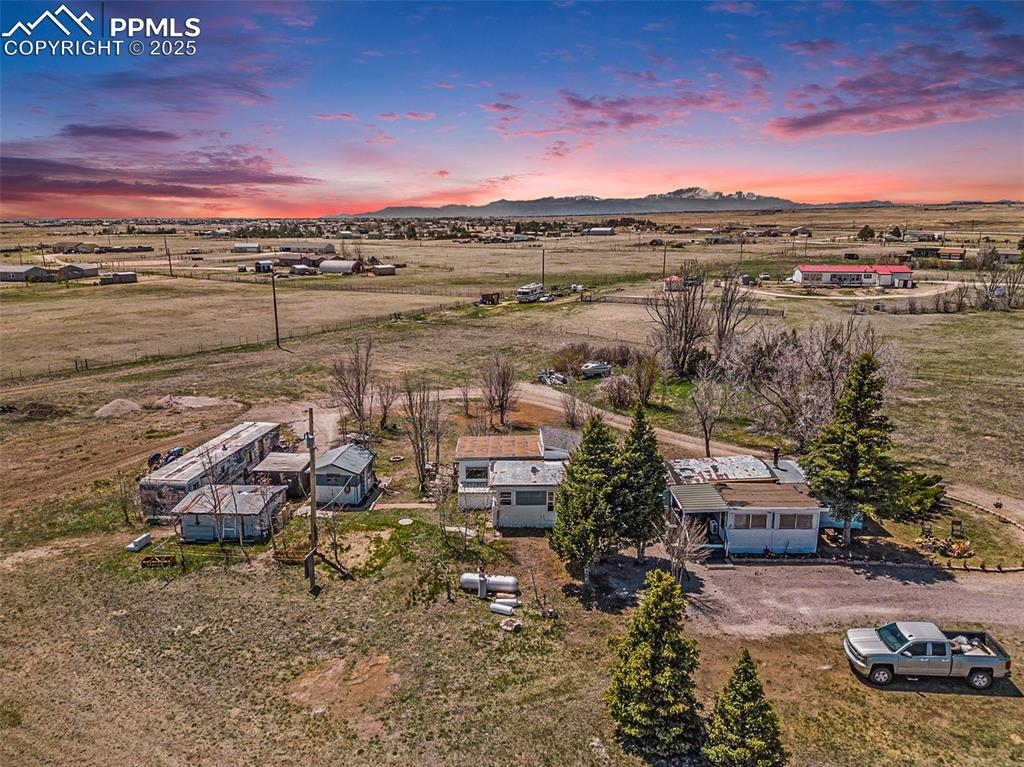 Image 2 of 25: Aerial view featuring a rural view and a mountain view