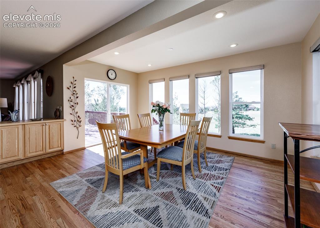 Image 18 of 48: Wood-finish flooring throughout