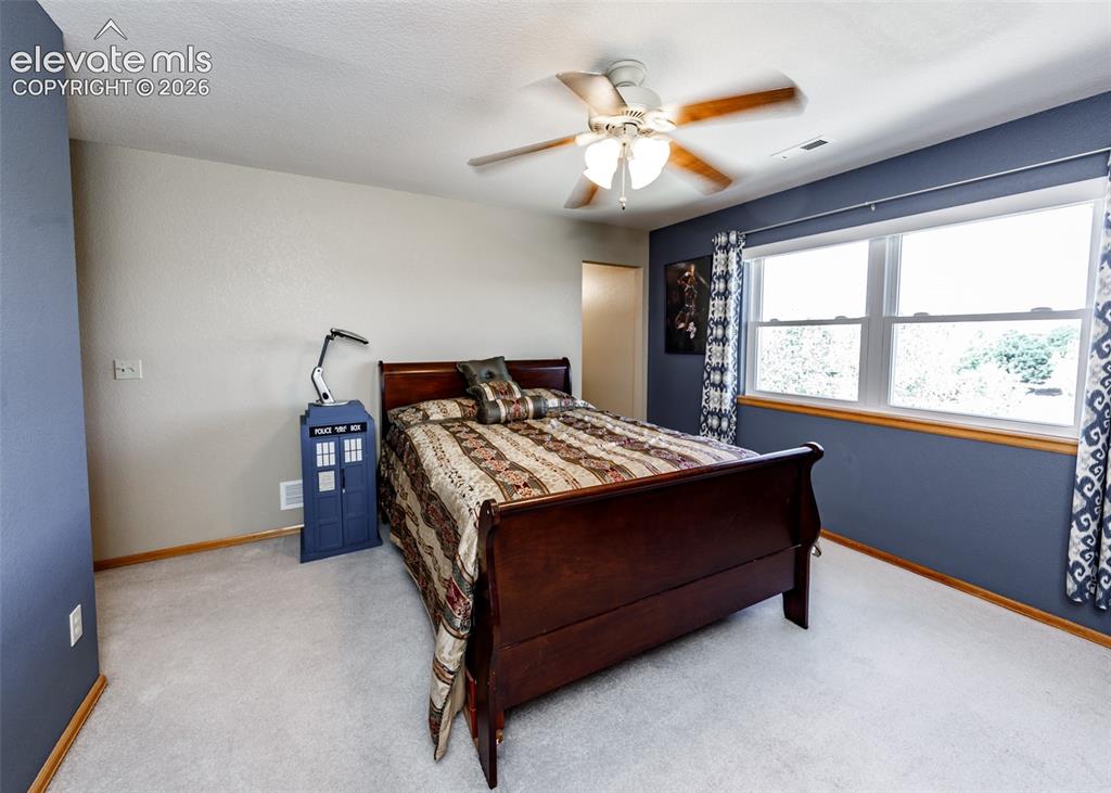Image 31 of 48: Recessed lighting, ceiling fan with light fixture, dual pane windows, and l