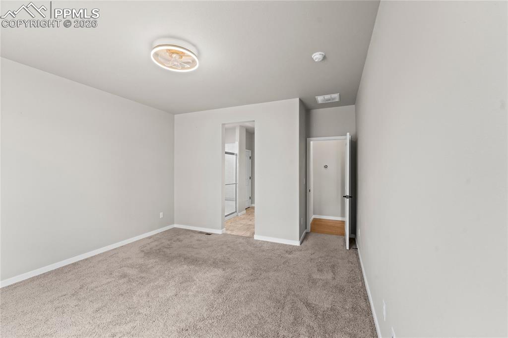 Image 27 of 50: Master Bedroom