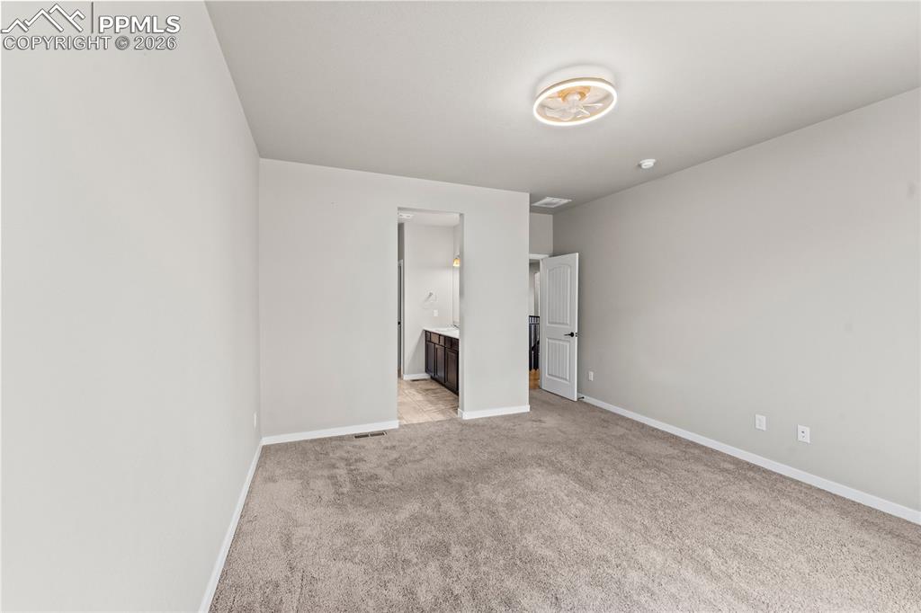 Image 28 of 50: Master Bedroom