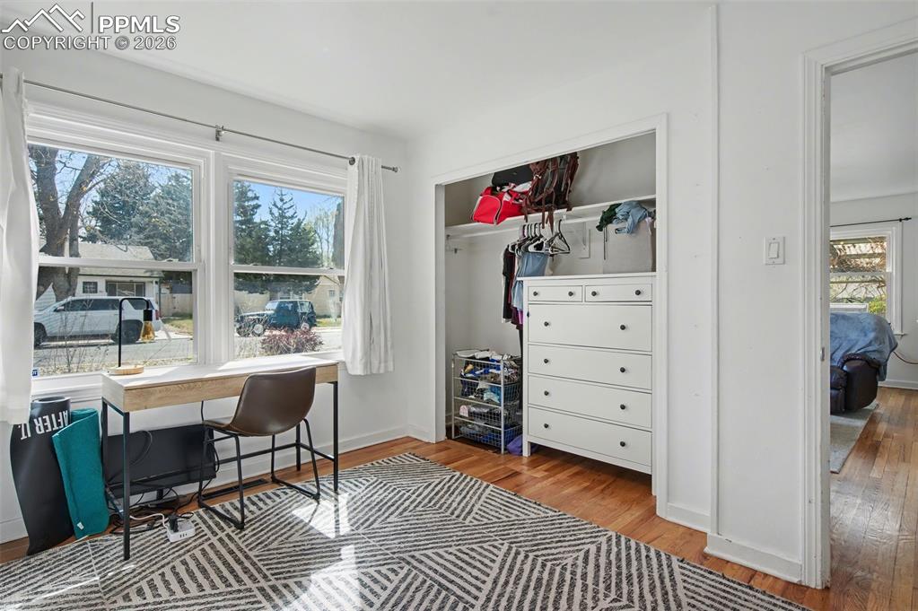 Image 22 of 28: Office area featuring light wood-style floors